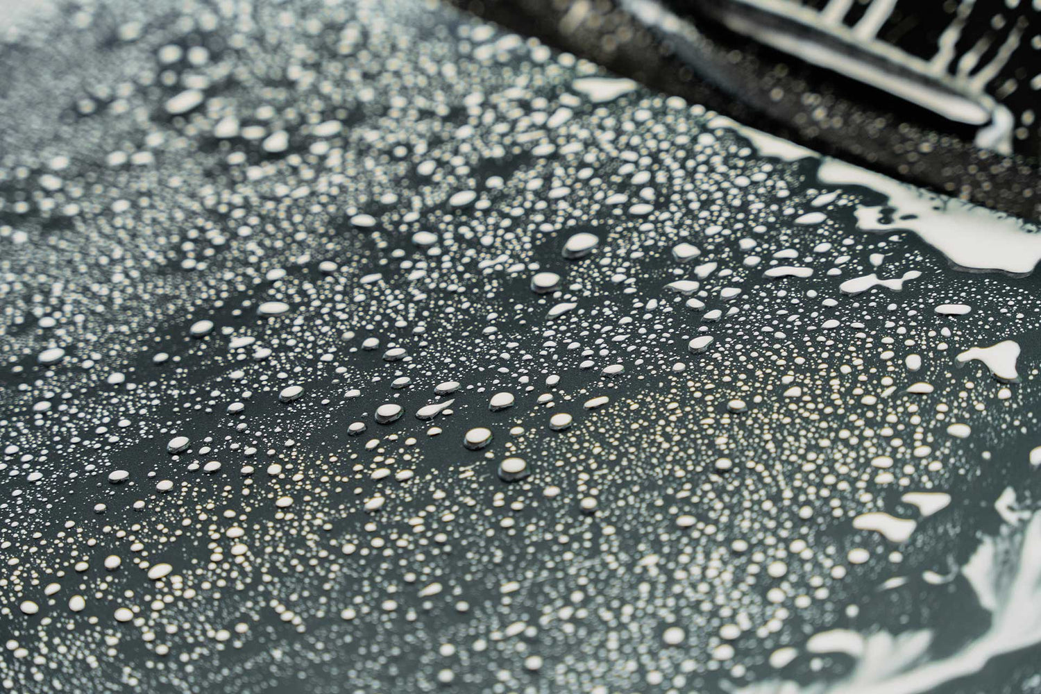 hydrophobic beading effect on surface of vehicle paint